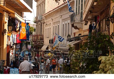 Stock Image - People at a market place in Athens, Greece. Fotosearch