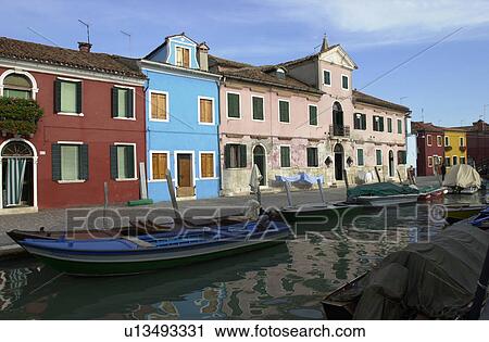 An array of colorful residential buildings in Venice, Burano, Italy View Large Photo Image Stock Image - An array of colorful residential buildings in Venice, Burano, Italy. Fotosearch