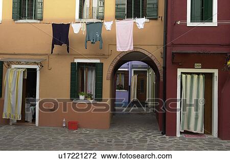 An array of colorful residential buildings in Venice, Burano, Italy View Large Photo Image Stock Image - An array of colorful residential buildings in Venice, Burano, Italy. Fotosearch