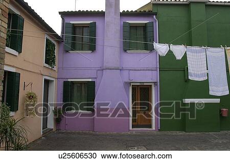 Stock Image - An array of colorful residential buildings in Venice, Burano, Italy. Fotosearch