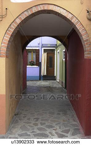 Arch way of a building in Venice, Burano, Italy View Large Photo Image Stock Image - Arch way of a building in Venice, Burano, Italy. Fotosearch