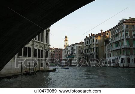Stock Photo - Bridge spanning over a canal in Venice, Italy. Fotosearch
