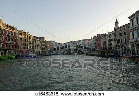 Bridge spanning over a canal in Venice, Italy View Large Photo Image Stock Photography - Bridge spanning over a canal in Venice, Italy. Fotosearch