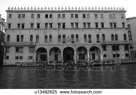 Building on the banks of a canal in Venice, Italy View Large Photo Image Stock Photography - Building on the banks of a canal in Venice, Italy. Fotosearch