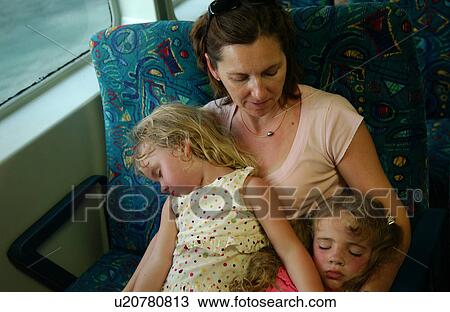 A young mother with her two daughters View Large Photo Image Stock Image - A young mother with her two daughters. Fotosearch