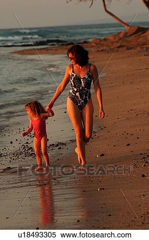 Stock Photography - Family on Beach - Hawaii. Fotosearch