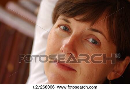Portrait of a young woman View Large Photo Image Stock Photograph - Portrait of a young woman. Fotosearch