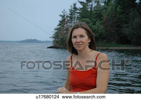 Picture - Woman at Lake. Fotosearch