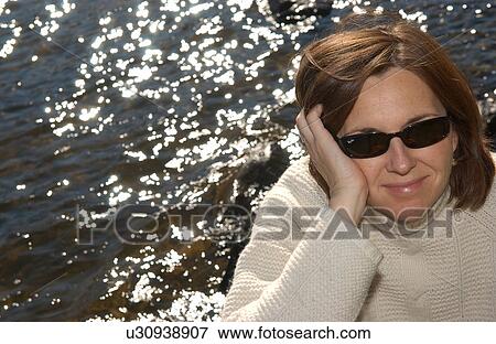 Woman in Sunglasses View Large Photo Image Stock Photo - Woman in Sunglasses. Fotosearch