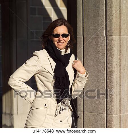 Young women in winter coat View Large Photo Image Stock Photo - Young women in winter coat. Fotosearch