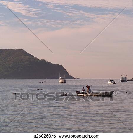 Boats off the coast of Ixtapa View Large Photo Image Stock Photography - Boats off the coast of Ixtapa. Fotosearch