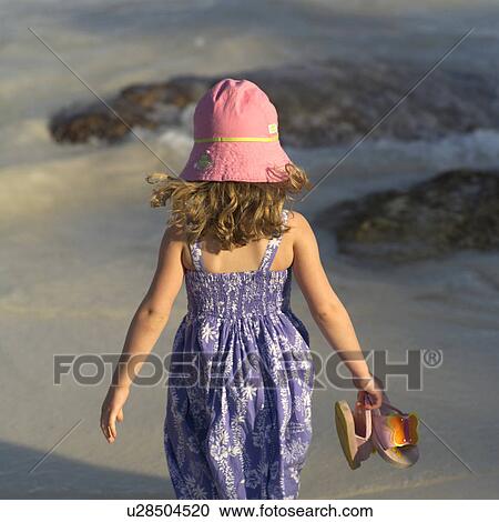 Stock Image - Girl at the Beach. Fotosearch