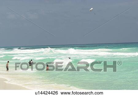 People at the beach in Mexico View Large Photo Image Stock Photograph - People at the beach in Mexico. Fotosearch