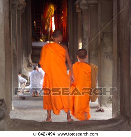 Back view of monks at Khmer Kingdom palace ruins View Large Photo Image Picture - Back view of monks at Khmer Kingdom palace ruins. Fotosearch
