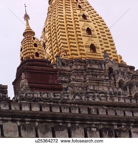 Stock Image - Golden dome of Bagan Buddhist temple. Fotosearch
