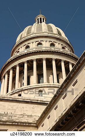 Stock Image - Low angle view of an ornate dome on a government building, Havana, Cuba. Fotosearch