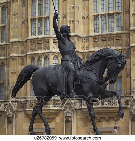 Statue of a human riding a horse in London, England View Large Photo Image Stock Photo - Statue of a human riding a horse in London, England. Fotosearch