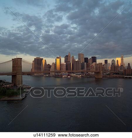 Stock Photo - View of Brooklyn Bridge and Manhattan, New York City. Fotosearch
