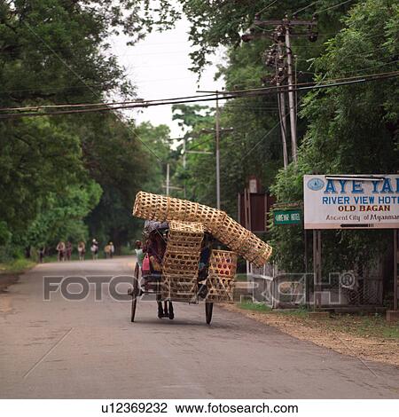 Stock Image - Baskets on the back of a cart. Fotosearch