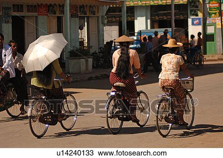 Stock Image - Bicycles on street in Myanmar. Fotosearch