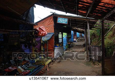 Ramshackle shelters in rural area View Large Photo Image Stock Photo - Ramshackle shelters in rural area. Fotosearch