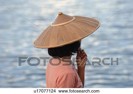Picture - Woman gazing at water. Fotosearch