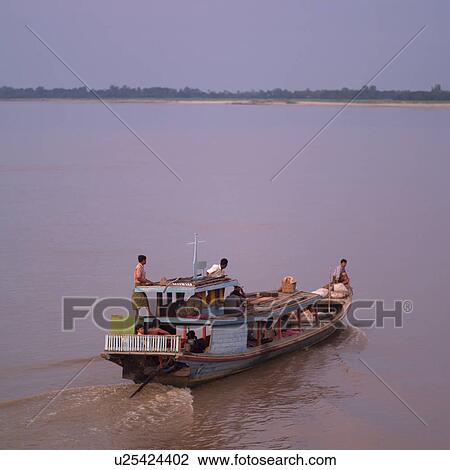 Stock Image - Boat on Ayevanwady River. Fotosearch