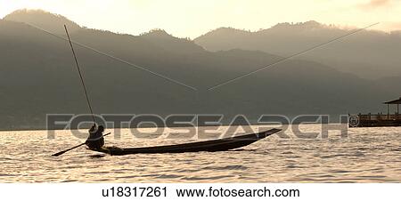 Crouching fisherman View Large Photo Image Stock Image - Crouching fisherman. Fotosearch