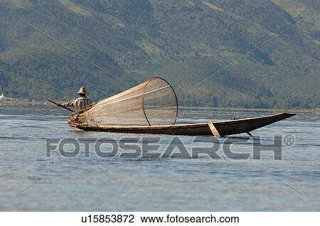 Fisherman in row boat View Large Photo Image Stock Image - Fisherman in row boat. Fotosearch