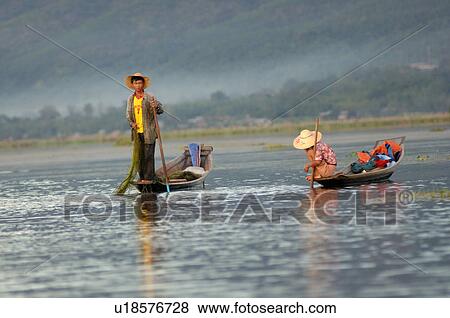 Fisherman leg rowing with friend View Large Photo Image Stock Photo - Fisherman leg rowing with friend. Fotosearch