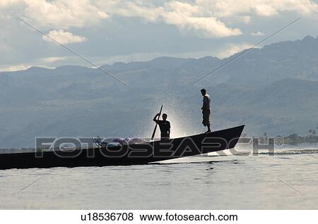 Fishermen in row boat View Large Photo Image Stock Photo - Fishermen in row boat. Fotosearch