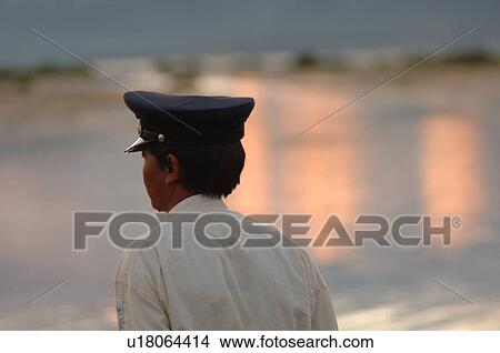 Picture - Rear view of police officer. Fotosearch