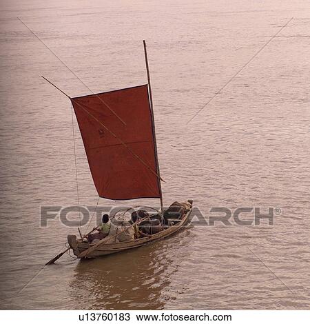 Rowboat with sail on Ayeyarwady River View Large Photo Image Stock Image - Rowboat with sail on Ayeyarwady River. Fotosearch