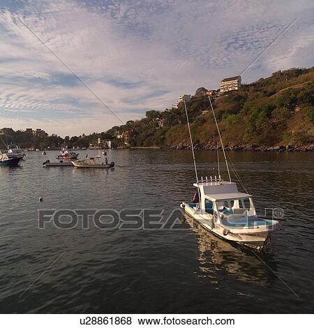 Boats off the coast of Ixtapa View Large Photo Image Stock Photo - Boats off the coast of Ixtapa. Fotosearch