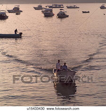 Stock Image - Boats on the coast. Fotosearch