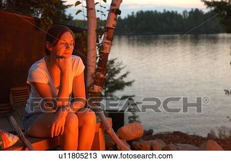 Woman by Campfire View Large Photo Image Stock Image - Woman by Campfire. Fotosearch