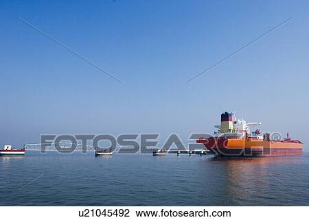 Industrial ship in the sea, Mumbai, Maharashtra, India View Large Photo Image Stock Image - Industrial ship in the sea, Mumbai, Maharashtra, India. Fotosearch