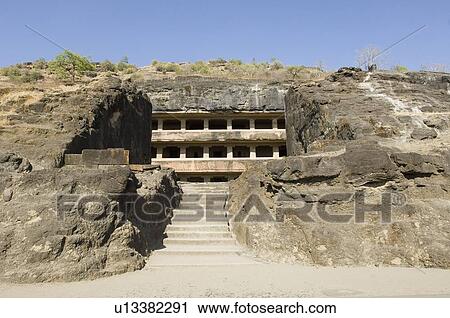 Low angle view of a rocky structure, Teen Taal, Ellora, Aurangabad, Maharashtra, India View Large Photo Image Stock Image - Low angle view of a rocky structure, Teen Taal, Ellora, Aurangabad, Maharashtra, India. Fotosearch