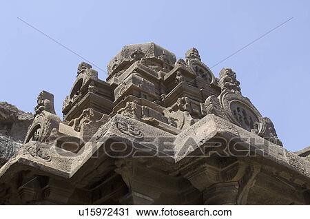 Stock Image - Low angle view of a temple, Ellora, Aurangabad, Maharashtra, India. Fotosearch