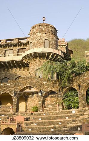 Low angle view of a fort behind an amphitheater, Neemrana Fort, Neemrana, Alwar, Rajasthan, India View Large Photo Image Stock Image - Low angle view of a fort behind an amphitheater, Neemrana Fort, Neemrana, Alwar, Rajasthan, India. Fotosearch