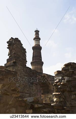 Picture - Low angle view of a tower monument, Qutab Minar, New Delhi, India. Fotosearch