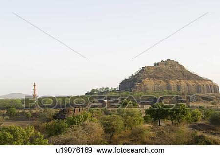 Minaret amidst old ruins of a fortress, Chand Minar, Daulatabad Fort, Daulatabad, Maharashtra, India View Large Photo Image Stock Photo - Minaret amidst old ruins of a fortress, Chand Minar, Daulatabad Fort, Daulatabad, Maharashtra, India. Fotosearch
