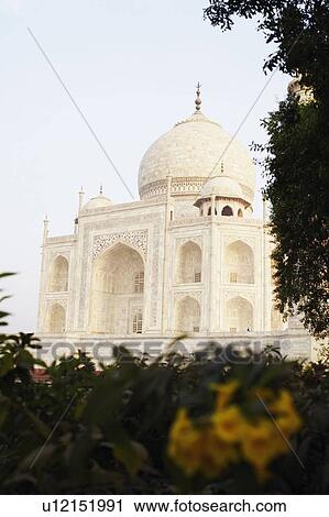Stock Image - Facade of a mausoleum, Taj Mahal, Agra, Uttar Pradesh, India. Fotosearch