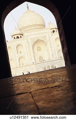 Mausoleum viewed through an arch, Taj Mahal, Agra, Uttar Pradesh, India View Large Photo Image Stock Image - Mausoleum viewed through an arch, Taj Mahal, Agra, Uttar Pradesh, India. Fotosearch