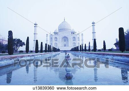 Stock Image - Pond in front of a mausoleum, Taj Mahal, Agra, Uttar Pradesh, India. Fotosearch
