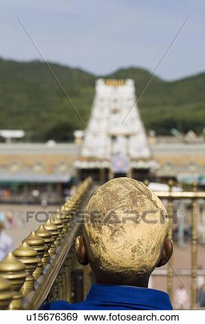 Stock Photo - Rear view of a man with his head covered with sandalwood paste, Tirupati, Tirumala Venkateswara Temple, Tirumala, Andhra Pradesh, India. Fotosearch