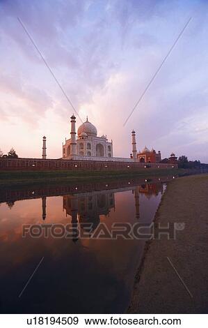 Reflection of a mausoleum in water, Taj Mahal, Agra, Uttar Pradesh, India View Large Photo Image Stock Photo - Reflection of a mausoleum in water, Taj Mahal, Agra, Uttar Pradesh, India. Fotosearch