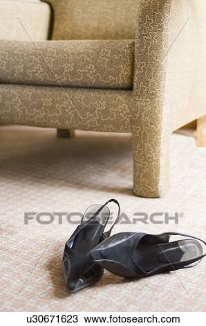 Close-up of a pair of sandals on the floor in a hotel View Large Photo Image Stock Image - Close-up of a pair of sandals on the floor in a hotel. Fotosearch