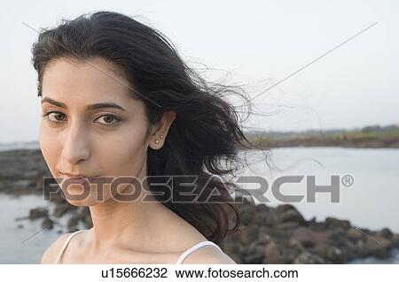 Portrait of a young woman View Large Photo Image Stock Image - Portrait of a young woman. Fotosearch