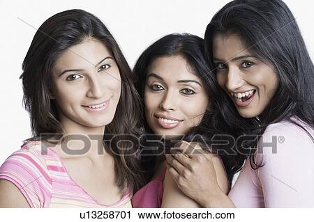 Portrait of three young women smiling View Large Photo Image Stock Image - Portrait of three young women smiling. Fotosearch